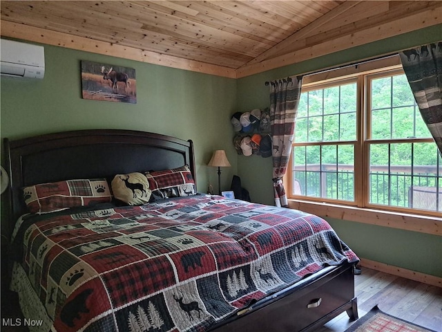 62158 Savage Rd, Cambridge, OH 43725 - bedroom with vaulted ceiling, a wall unit AC, wood finished floors, wooden ceiling, and baseboards