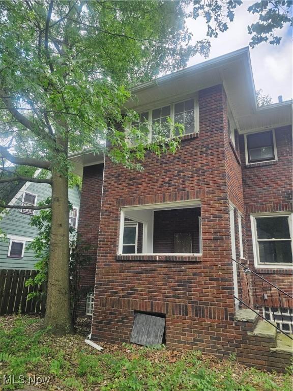 11 Adams St, Berea, OH 44017 - view of side of home featuring brick siding