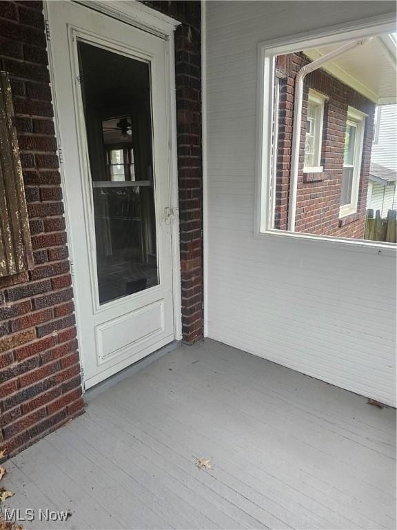 11 Adams St, Berea, OH 44017 - doorway to property featuring brick siding