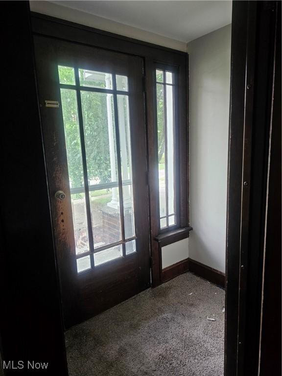 11 Adams St, Berea, OH 44017 - doorway to outside featuring baseboards
