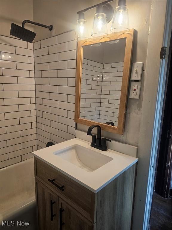 11 Adams St, Berea, OH 44017 - bathroom with vanity and  shower combination