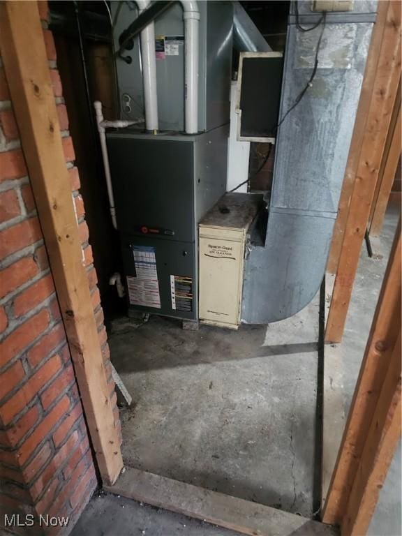 11 Adams St, Berea, OH 44017 - utility room with heating unit
