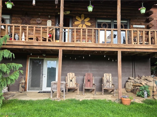 424 Avalon Rd SW, Dellroy, OH 44620 - rear view of property with a patio area, a balcony, and log siding
