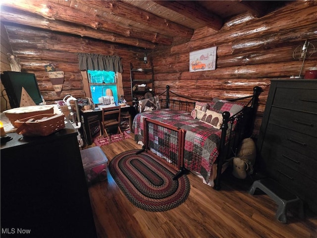 424 Avalon Rd SW, Dellroy, OH 44620 - bedroom with wood finished floors, wood ceiling with exposed beams, and log walls