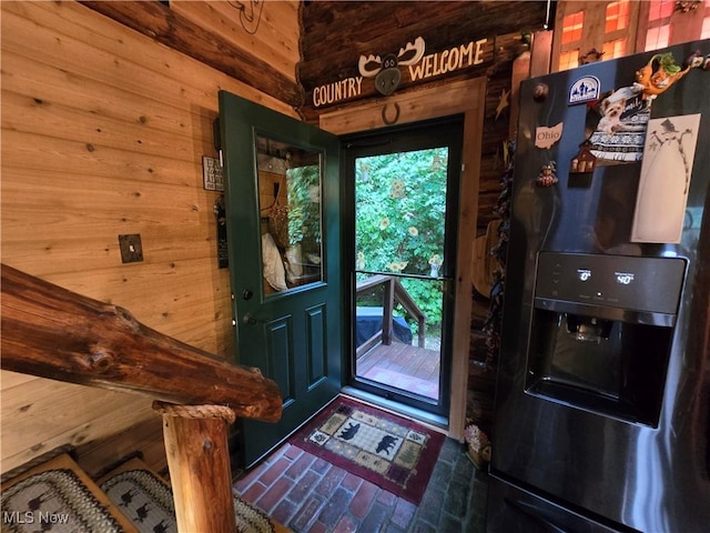 424 Avalon Rd SW, Dellroy, OH 44620 - entrance foyer featuring wooden walls and brick patterned flooring