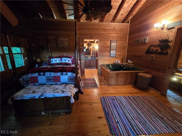 424 Avalon Rd SW, Dellroy, OH 44620 - bedroom featuring wooden walls, light wood finished floors, and wooden ceiling