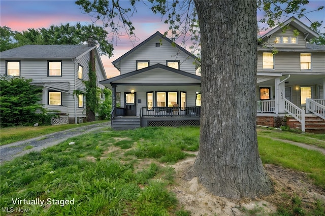 15417 Parkgrove Ave, Cleveland, OH 44110 - american foursquare style home featuring covered porch