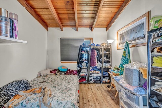 15417 Parkgrove Ave, Cleveland, OH 44110 - bedroom with wood finished floors and a wooden ceiling with exposed beams