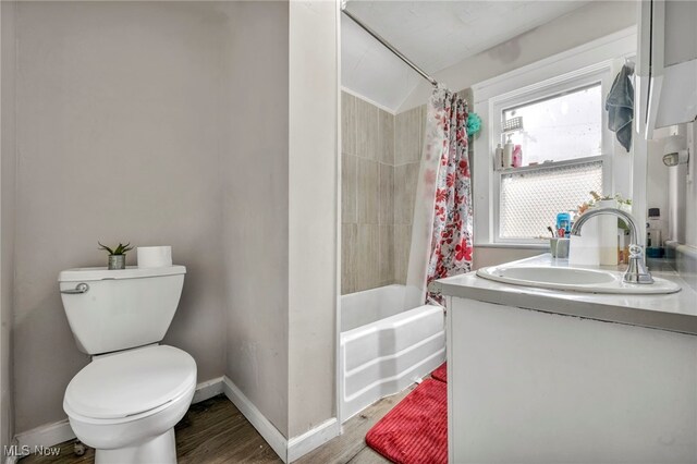 15417 Parkgrove Ave, Cleveland, OH 44110 - bathroom featuring wood finished floors, vanity, and shower / bath combo