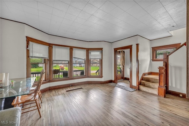 15417 Parkgrove Ave, Cleveland, OH 44110 - foyer entrance with wood finished floors and stairs