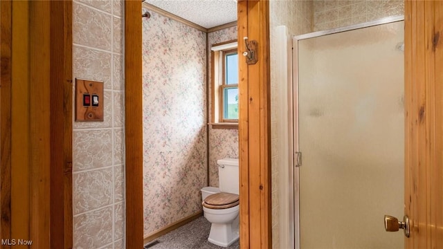 73117 Deck Rd, Freeport, OH 43973 - full bath featuring toilet, wallpapered walls, ornamental molding, a shower stall, and baseboards