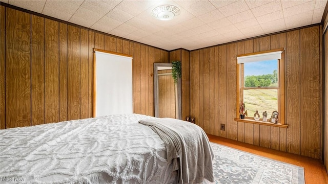73117 Deck Rd, Freeport, OH 43973 - carpeted bedroom featuring wood walls
