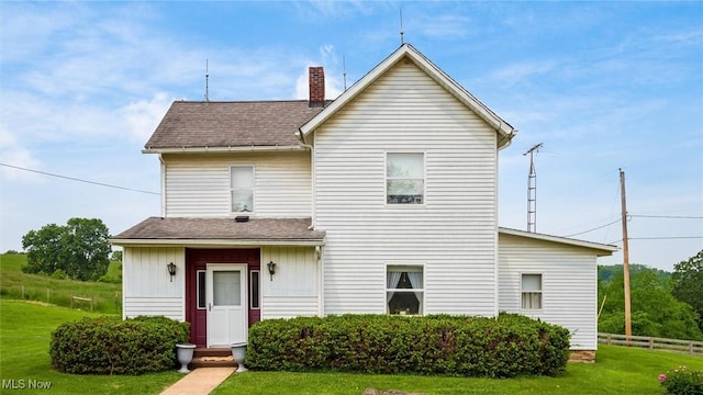 73117 Deck Rd, Freeport, OH 43973 - rear view of house with a chimney, roof with shingles, and board and batten siding