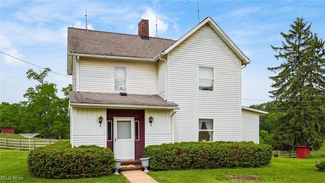 73117 Deck Rd, Freeport, OH 43973 - view of front of property with a chimney, roof with shingles, and board and batten siding