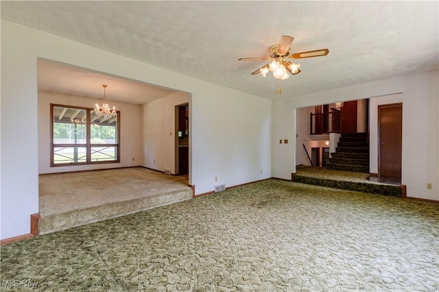 41510 Alderlick Rd, Wellsville, OH 43968 - unfurnished living room with carpet flooring, a chandelier, baseboards, and stairs