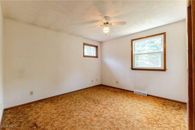 41510 Alderlick Rd, Wellsville, OH 43968 - carpeted empty room with ceiling fan and baseboards