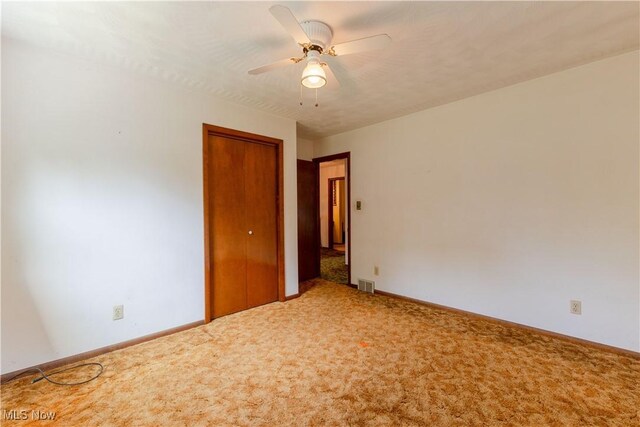 41510 Alderlick Rd, Wellsville, OH 43968 - spare room with carpet flooring, baseboards, and ceiling fan