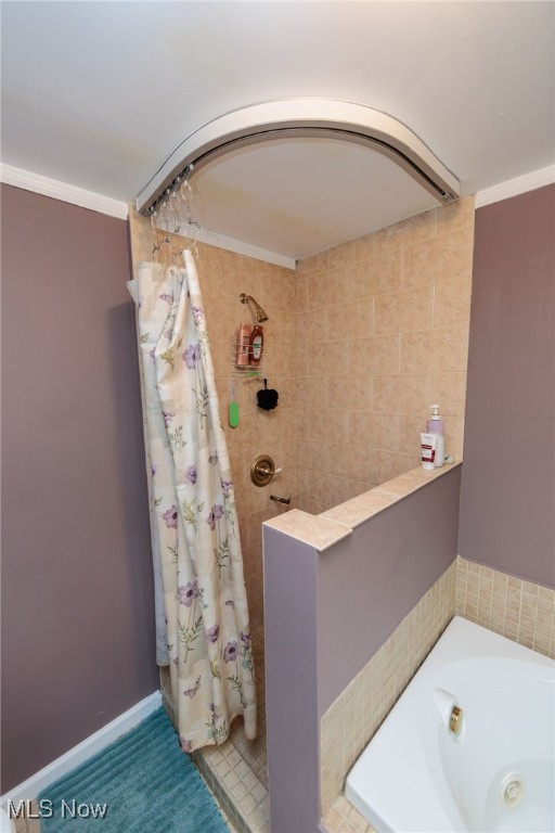 10229 State Rd, North Royalton, OH 44133 - full bathroom with tiled shower and a tub with jets