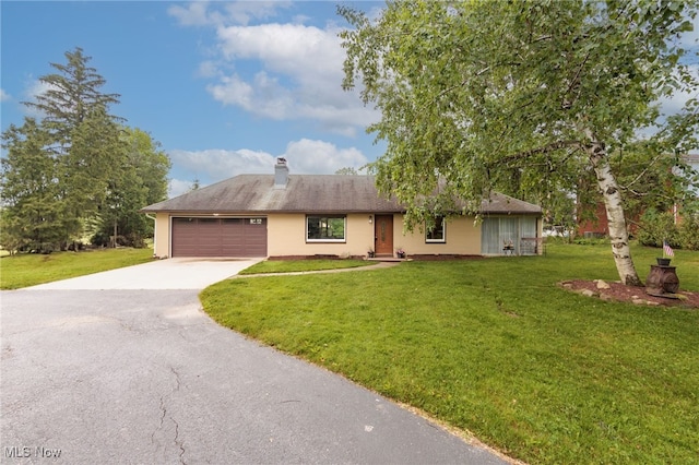 10229 State Rd, North Royalton, OH 44133 - ranch-style house with asphalt driveway, a garage, a front yard, and a chimney