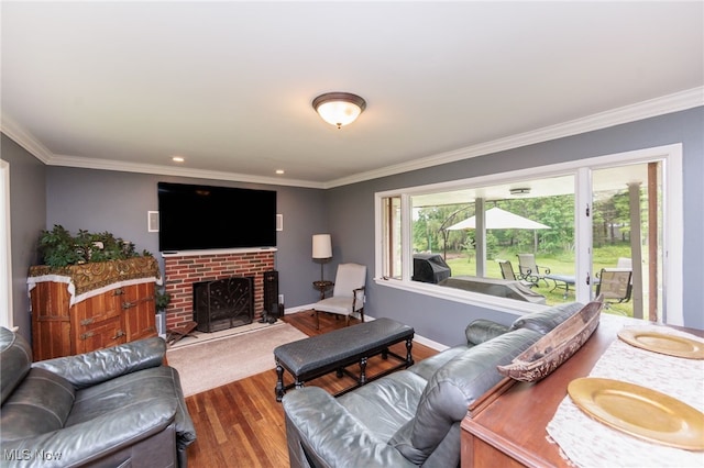 10229 State Rd, North Royalton, OH 44133 - living room with wood finished floors, crown molding, baseboards, and a fireplace