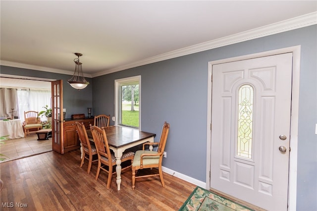 10229 State Rd, North Royalton, OH 44133 - dining area featuring ornamental molding, wood finished floors, and baseboards