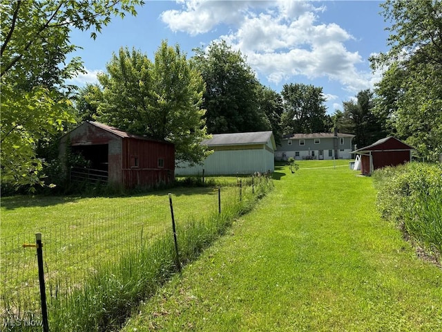 5301 S Ridge Rd W, Ashtabula, OH 44004 - view of yard featuring a pole building and an outdoor structure