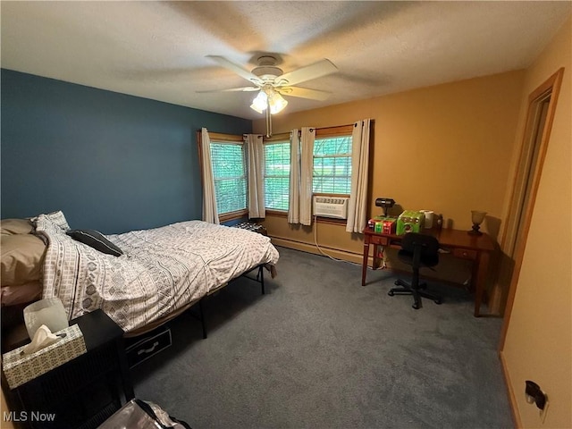 5301 S Ridge Rd W, Ashtabula, OH 44004 - carpeted bedroom with a ceiling fan and a baseboard heating unit