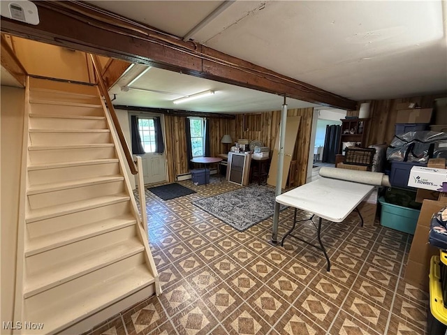 5301 S Ridge Rd W, Ashtabula, OH 44004 - below grade area featuring stairs and wood walls