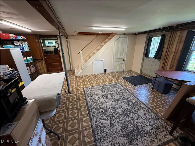 5301 S Ridge Rd W, Ashtabula, OH 44004 - below grade area with stairway and tile patterned floors