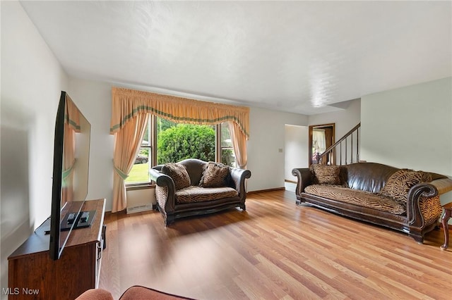 2322 Westview Rd, Cortland, OH 44410 - living area featuring light wood finished floors and stairway