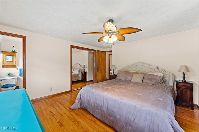 2322 Westview Rd, Cortland, OH 44410 - bedroom featuring light wood-style floors, baseboards, a closet, and a ceiling fan