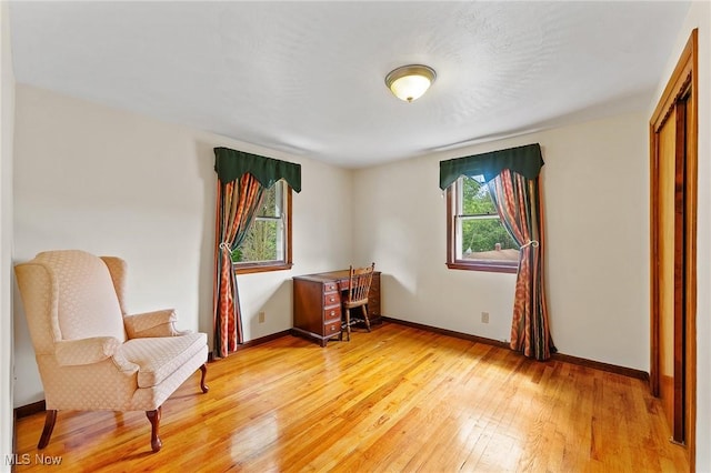 2322 Westview Rd, Cortland, OH 44410 - bedroom featuring multiple windows, light wood finished floors, and baseboards