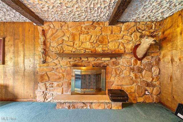 2322 Westview Rd, Cortland, OH 44410 - detailed view of beamed ceiling, carpet, wood walls, and a fireplace