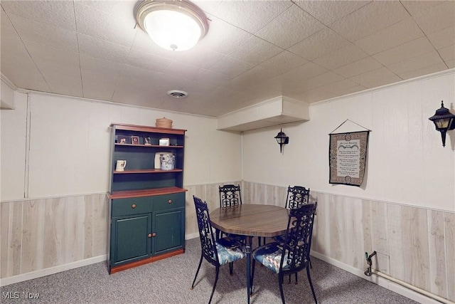 132 Karen Pl, Wintersville, OH 43953 - dining room with carpet floors, a wainscoted wall, and wooden walls