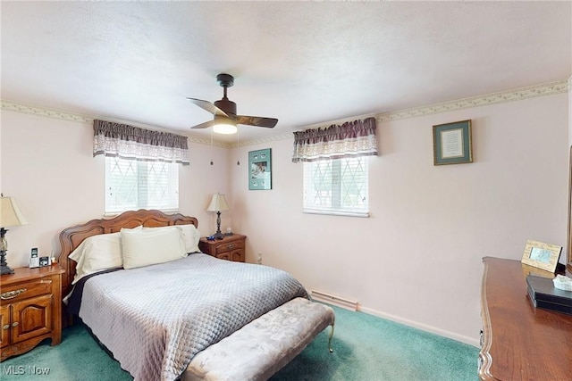 132 Karen Pl, Wintersville, OH 43953 - carpeted bedroom featuring a ceiling fan, baseboards, and baseboard heating