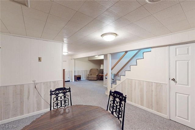 132 Karen Pl, Wintersville, OH 43953 - basement with carpet, wooden walls, and stairs