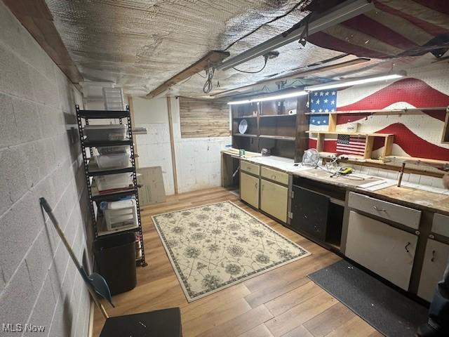 3232 Circle Dr, Cortland, OH 44410 - kitchen with light wood finished floors and concrete block wall
