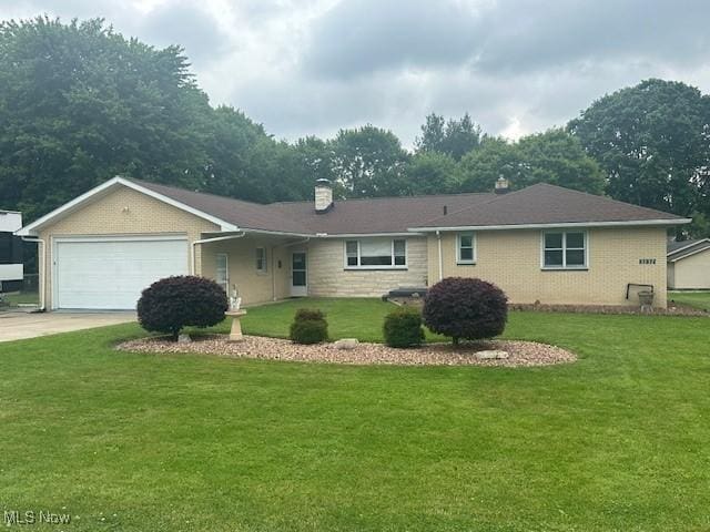 3232 Circle Dr, Cortland, OH 44410 - ranch-style house featuring a garage, a front lawn, a chimney, driveway, and brick siding