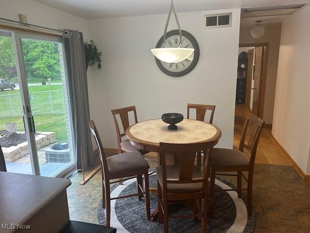 3232 Circle Dr, Cortland, OH 44410 - dining space with baseboards