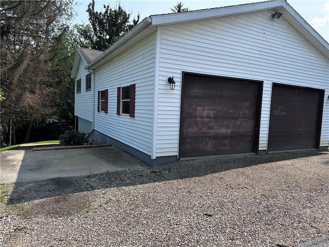 1029 Fowler Dr, Caldwell, OH 43724 - view of property exterior with an outdoor structure