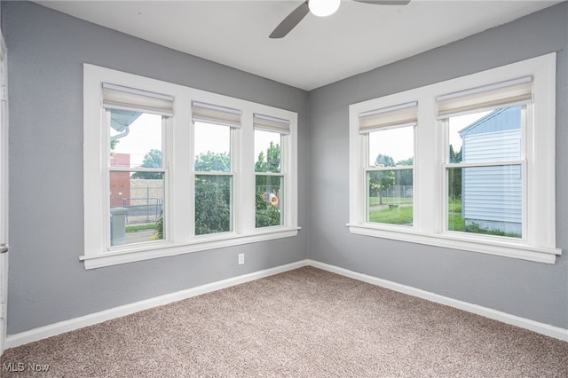 1168 Onondago Ave, Akron, OH 44305 - carpeted spare room featuring ceiling fan and baseboards