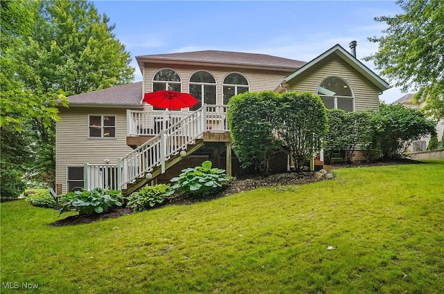 2634 Deer Ridge Run, Cuyahoga Falls, OH 44223 - rear view of house featuring stairs, a lawn, and a wooden deck