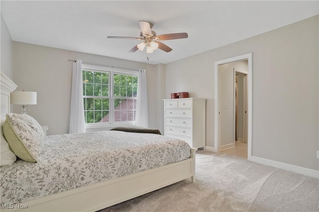 2634 Deer Ridge Run, Cuyahoga Falls, OH 44223 - bedroom featuring light carpet and a ceiling fan