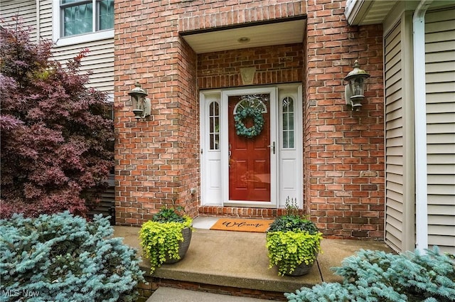 2634 Deer Ridge Run, Cuyahoga Falls, OH 44223 - doorway to property featuring brick siding