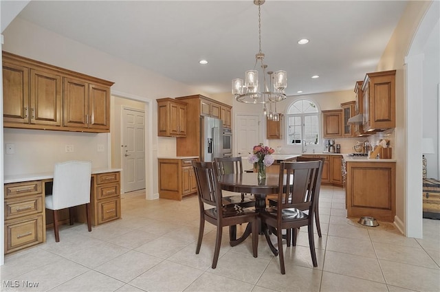 2634 Deer Ridge Run, Cuyahoga Falls, OH 44223 - dining area featuring built in desk, a chandelier, light tile patterned flooring, and recessed lighting