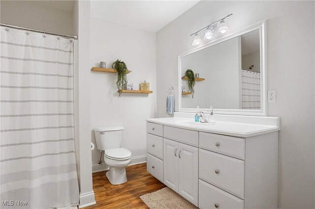 2634 Deer Ridge Run, Cuyahoga Falls, OH 44223 - bathroom featuring wood finished floors, vanity, and a shower with curtain