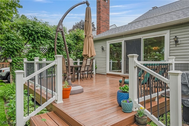 1120 Croyden Rd, Lyndhurst, OH 44124 - wooden deck featuring outdoor dining area