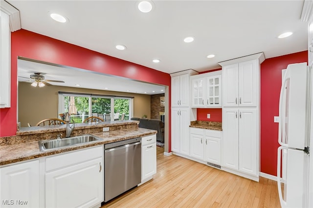 1120 Croyden Rd, Lyndhurst, OH 44124 - kitchen featuring dishwasher, freestanding refrigerator, light wood-type flooring, white cabinets, and glass insert cabinets