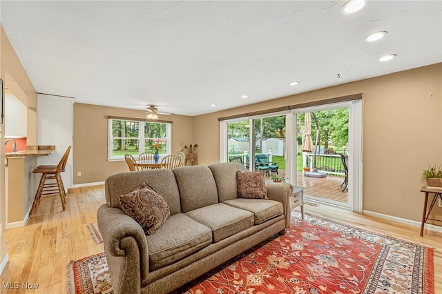 1120 Croyden Rd, Lyndhurst, OH 44124 - living room with light wood-type flooring, ceiling fan, and recessed lighting