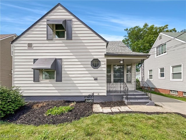 24451 Devoe Ave, Euclid, OH 44123 - view of front facade with a porch and roof with shingles